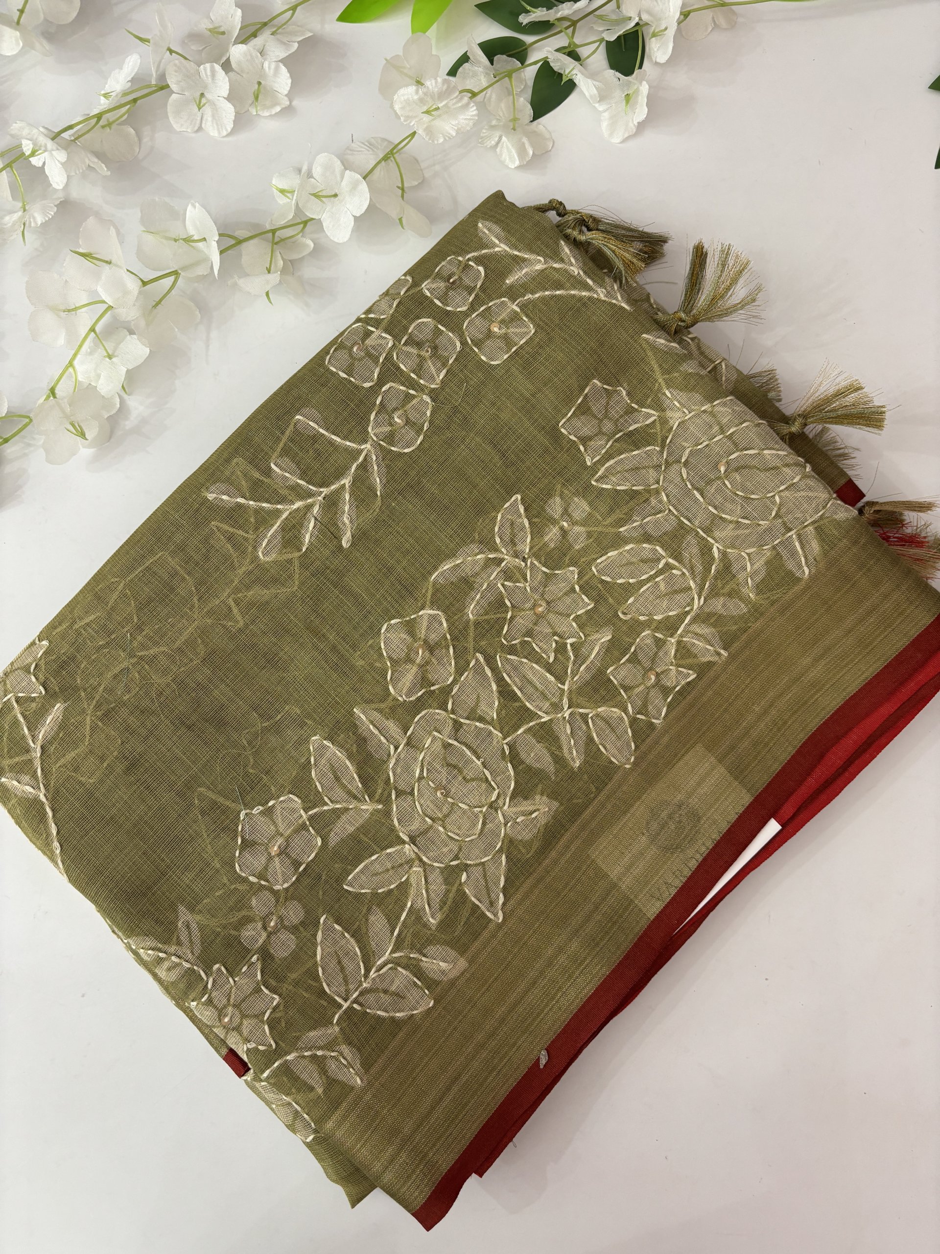 Green tissue linen saree with blouse