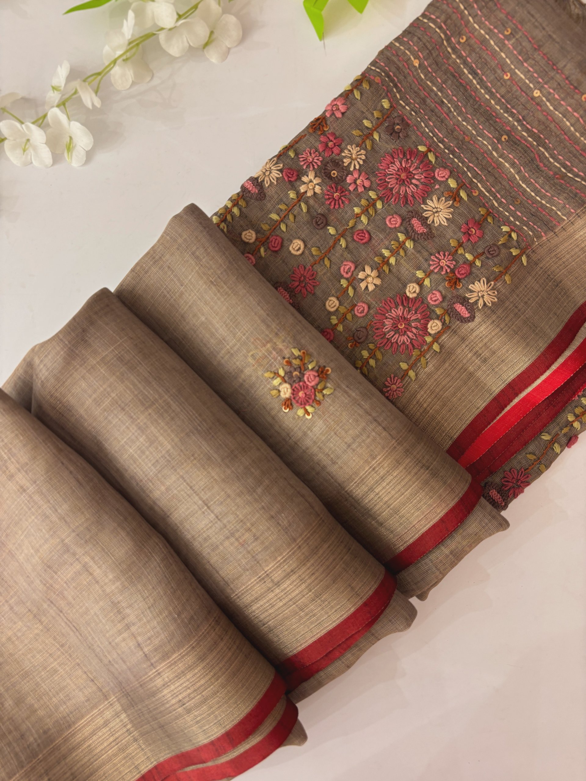 Grey Linen Tissue Saree with Knot Work