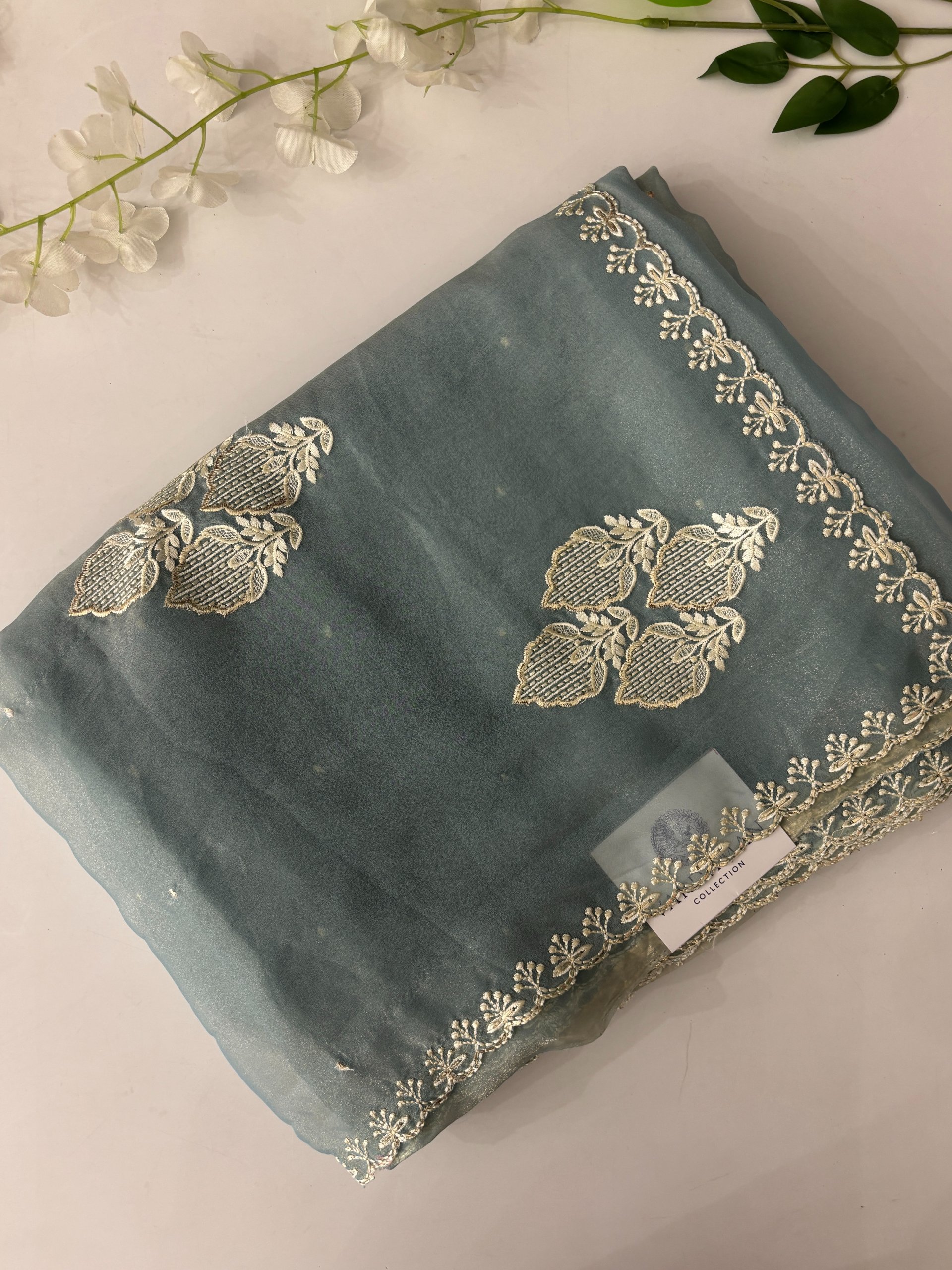 Blue Georgette Shimmer Saree with Delicate Embroidery