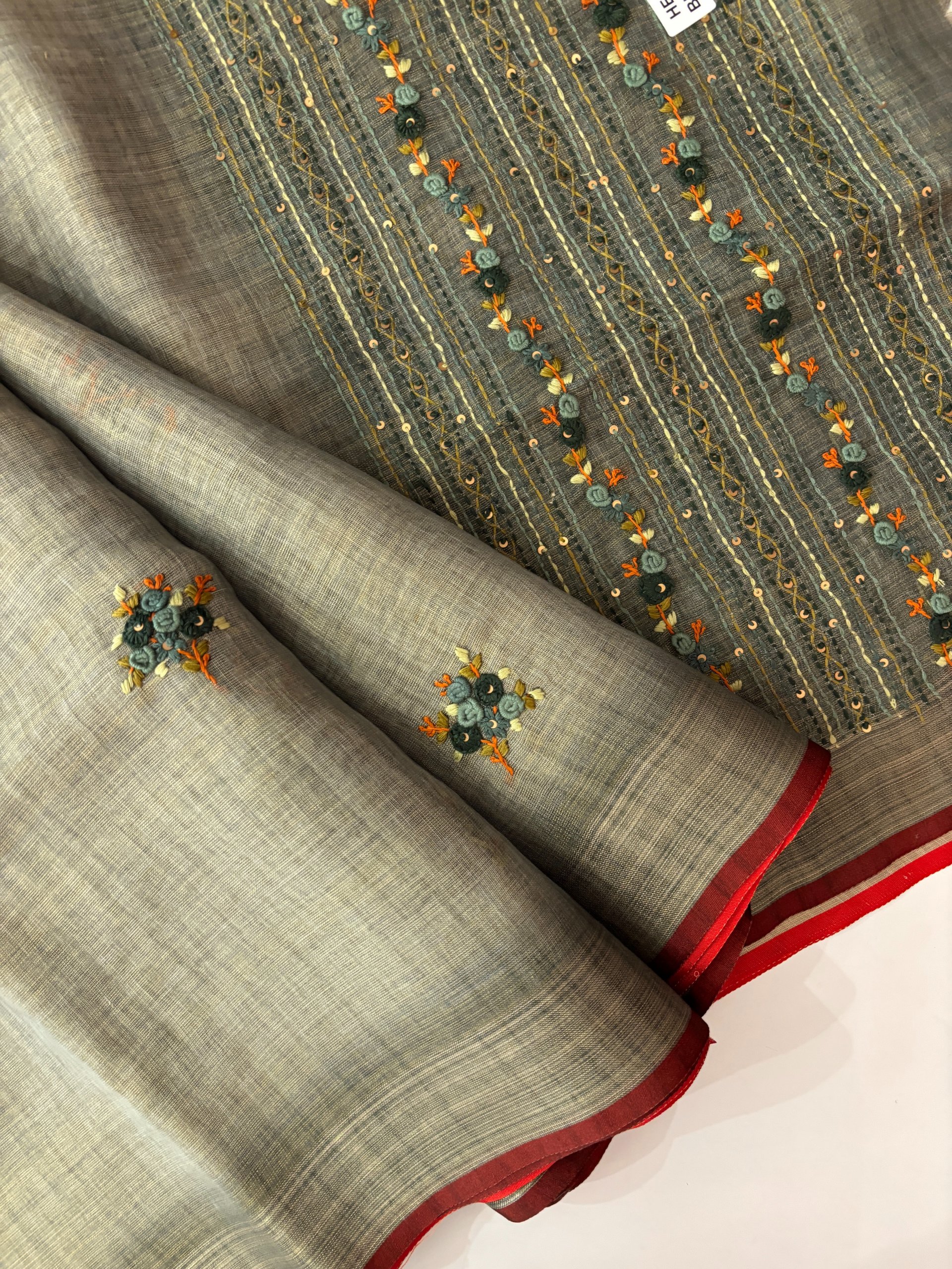 Grey Linen Tissue Saree with Knot Work