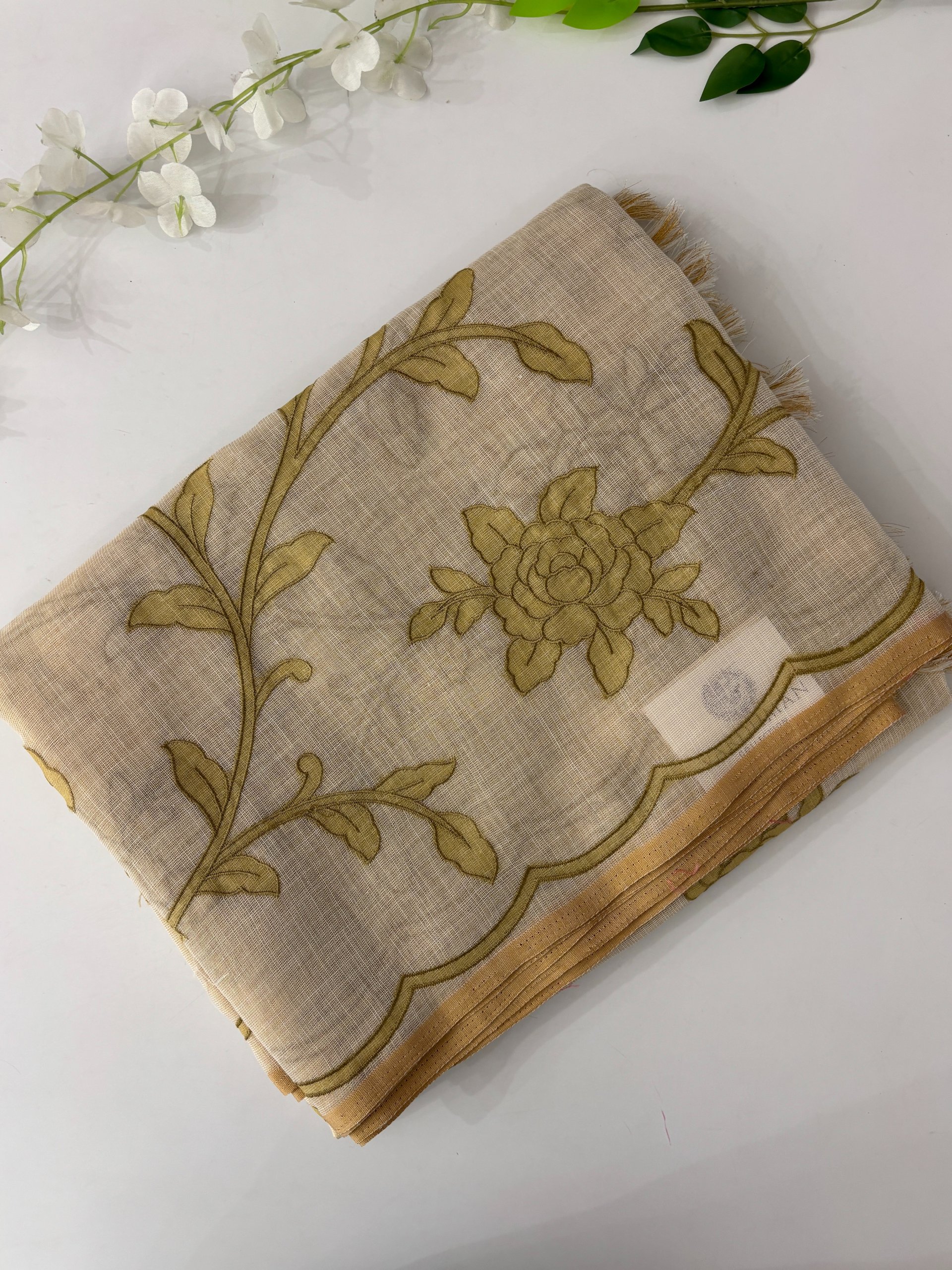 Cream with Green Applique Work Saree.