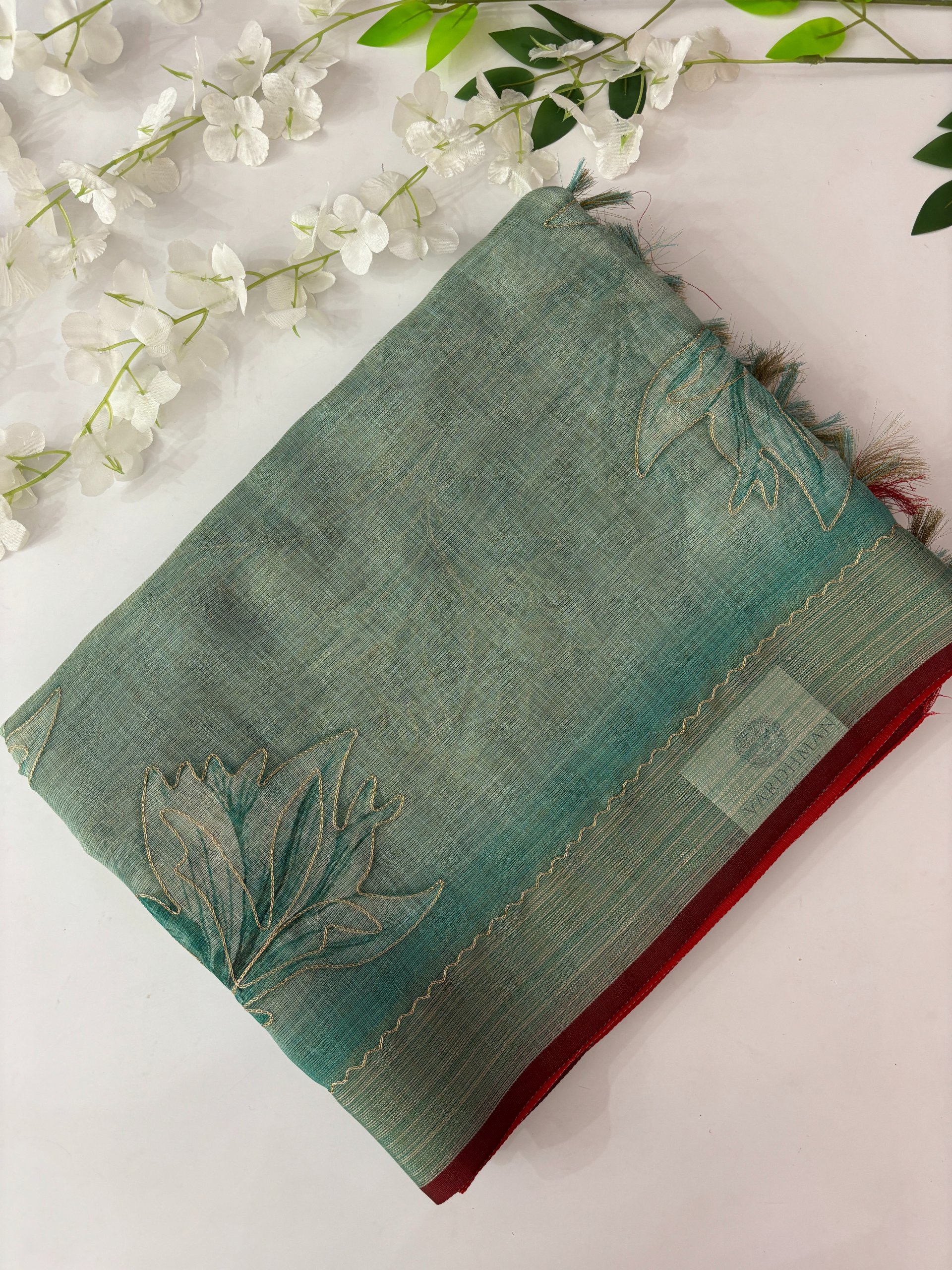 Turquoise Linen Tissue Saree with Aari Work