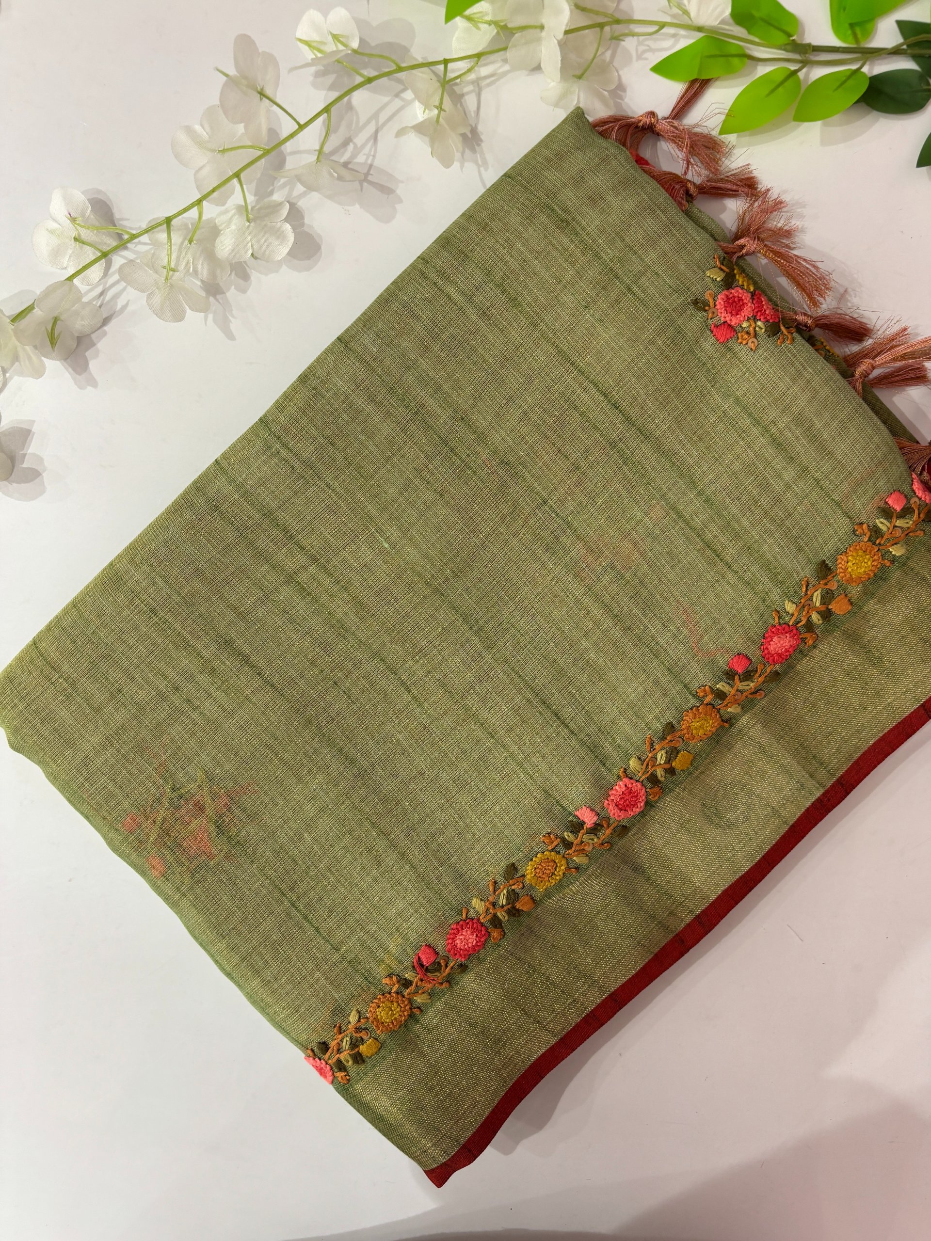Green Linen Tissue Saree with Knot Work