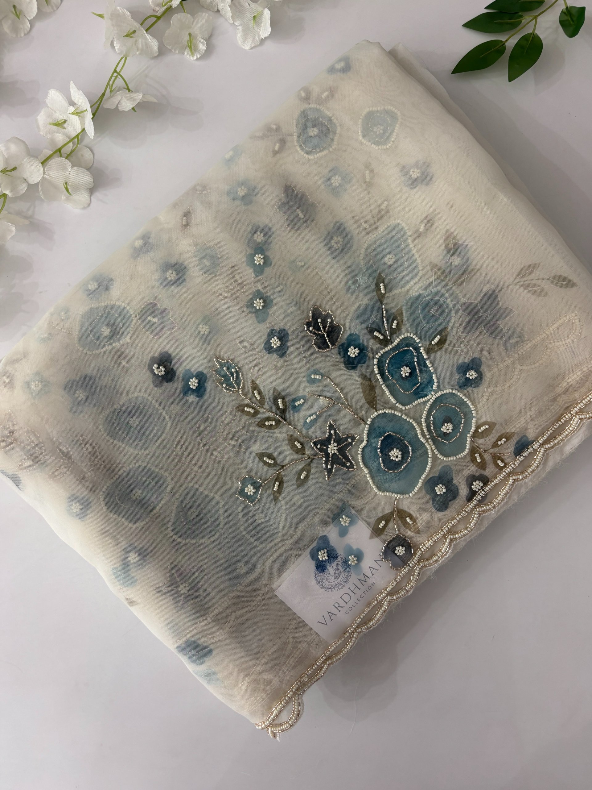 Blue Floral White Organza Sarees with Handwork
