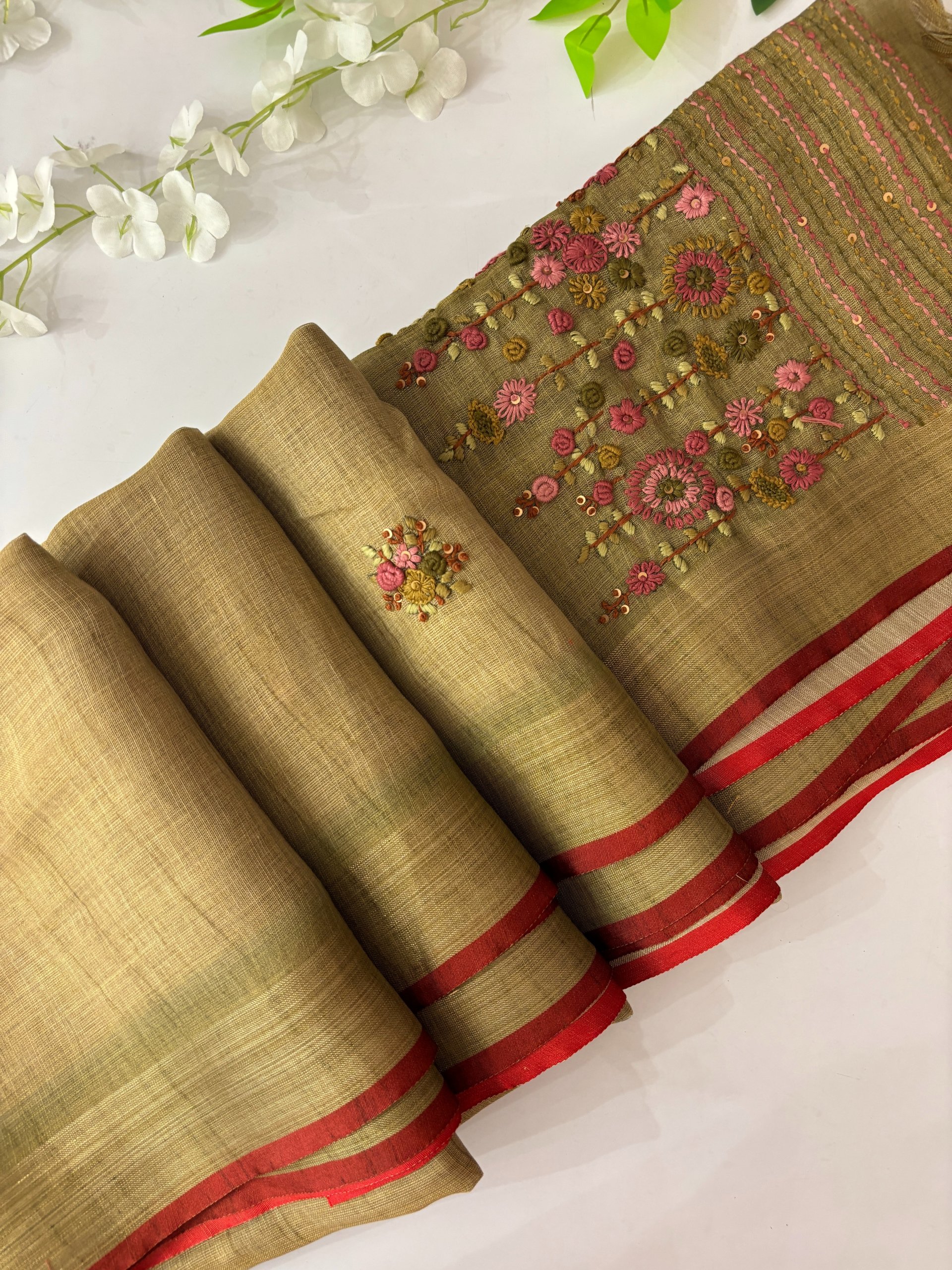 Light Dusty Parrot Green Linen Tissue Saree with Knot Work